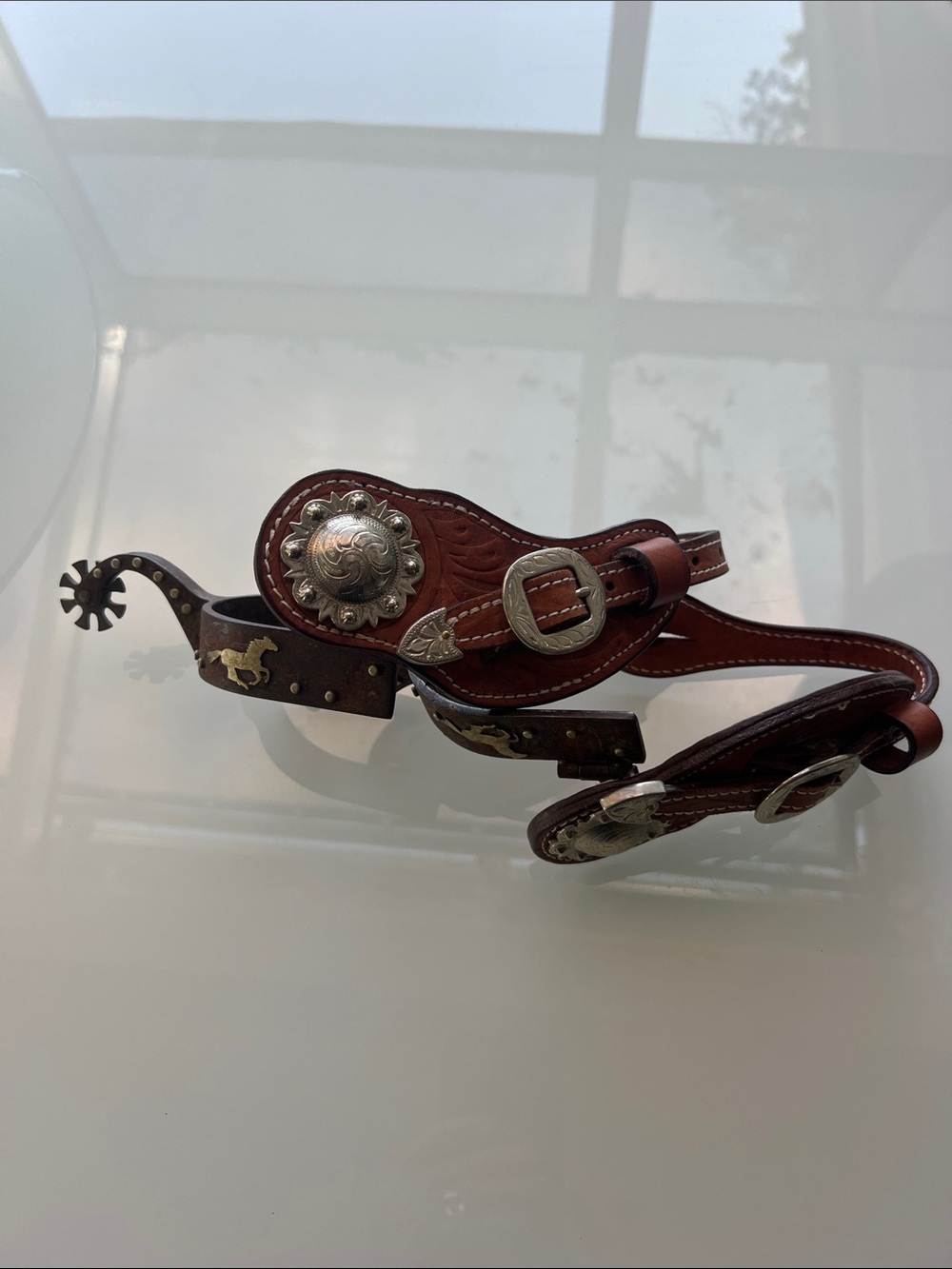Brown Leather Western Spurs with Decorative Silver Conchos